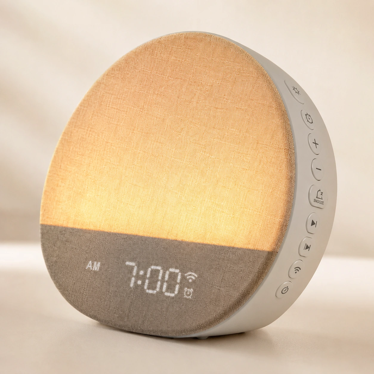 Close-up angled product photo of the Dreamegg Sunrise 1 Wake Up Alarm Clock showing fabric texture, side buttons, and digital time.