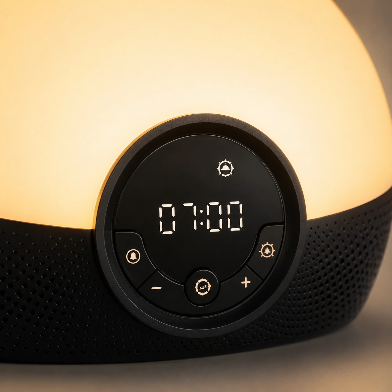 Front product view of the Lumie Bodyclock Rise150 Alarm Clock with a soft warm yellow glow.